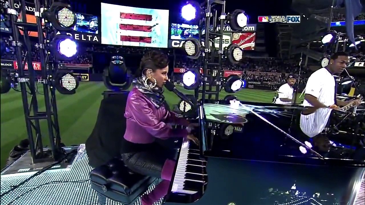 Alicia Keys in Fuchsia(?) Thigh Boots