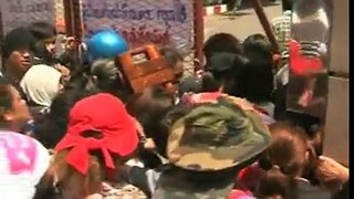 Thai Army storms Red Shirt encampment and arrests protest leaders