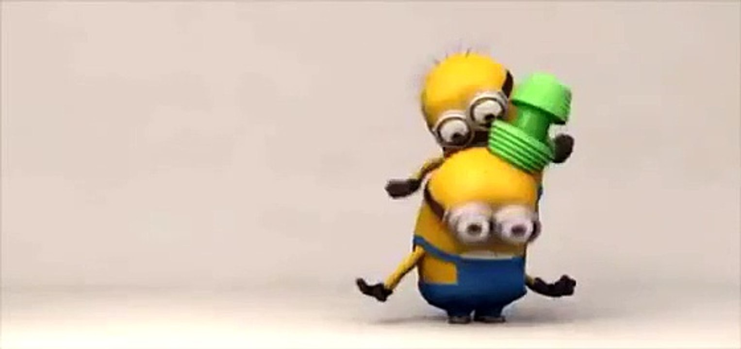 Minions Playing with Green Toy