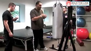 Ronie T10-L1 paraplegic spinal cord injury SCI recovery standing boxing exercise May 2011