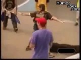 Skater hits security guard in the head with a skateboard