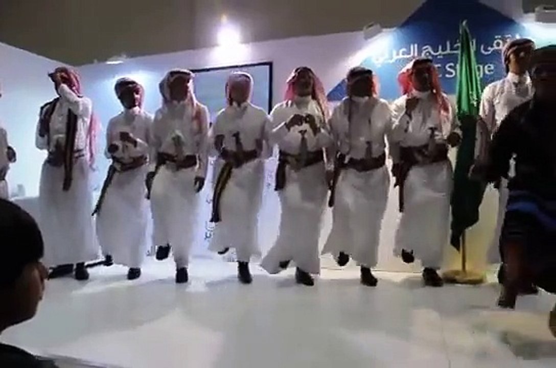 Music and dance ensemble from Rijal Alma, Asir, Saudi Arabia, in the Abu Dhabi Book Fair 2013