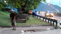 Laos Pakse: crazy guy on the sidewalk