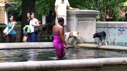 Retarded Lady Takes A Bath In The Fountain