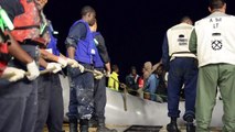 African migrants rescued after boat begins sinking off Italian coast