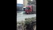 Bizarre video sees woman run in front of truck in staged crash