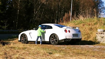 Kid driving Nissan GT-R