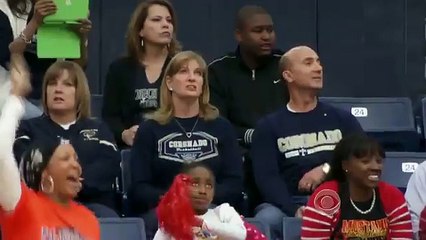 Touching moment basketball player from opposite team hands ball to disabled playe