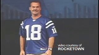Jeff Fisher wearing Manning's jersey.  Coach Dungy lifting the curse.