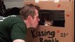 cat kisses human in kissing booth cute  Clip