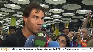 Tired Rafael Nadal back in Spain after US Open win