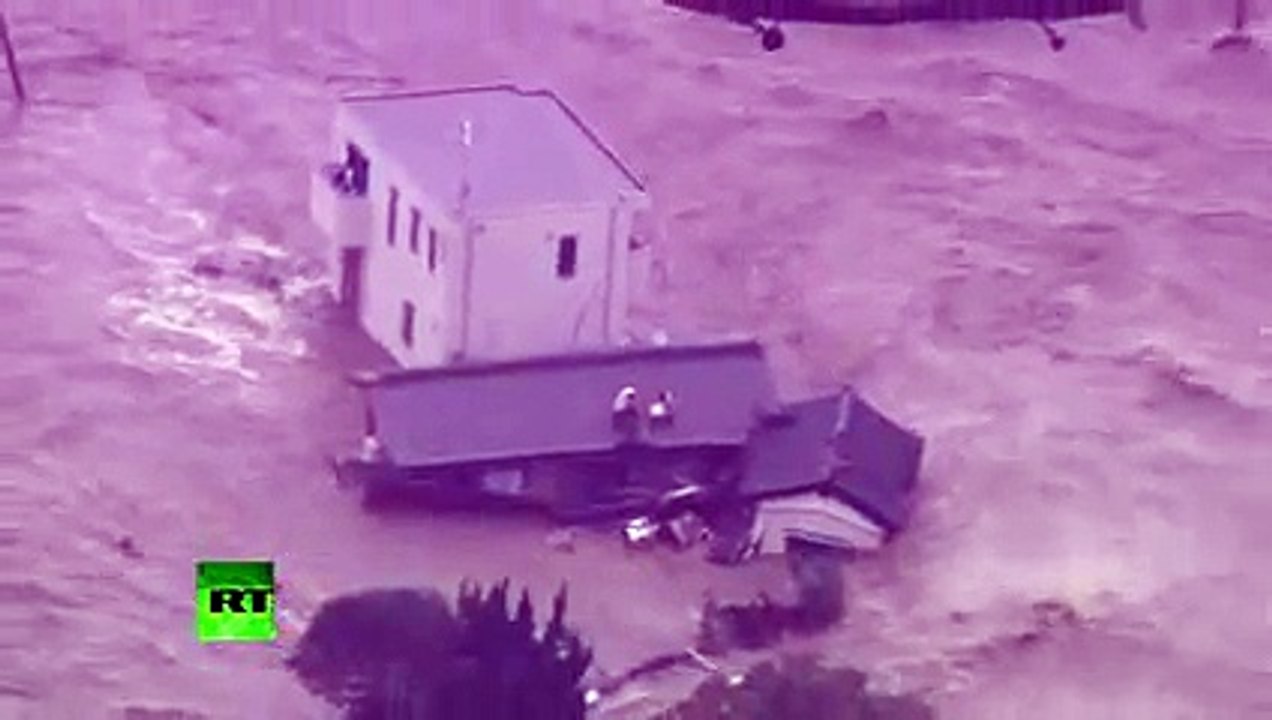 Tsunami-like wall of water after floods hit Japan tens of thousands evacuated