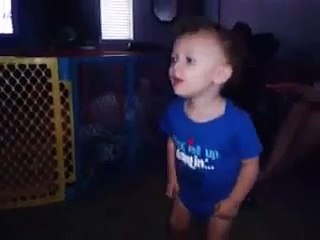 Baby Dancing to 'Who Let The Dogs' out