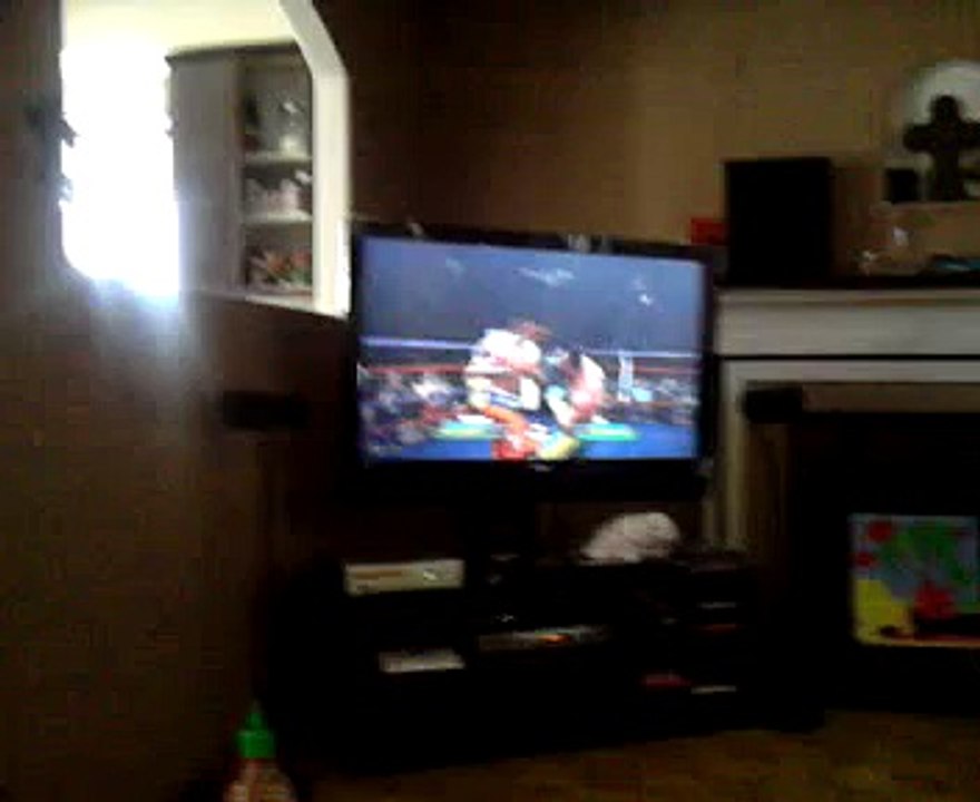 Milana playing Fight night round 4