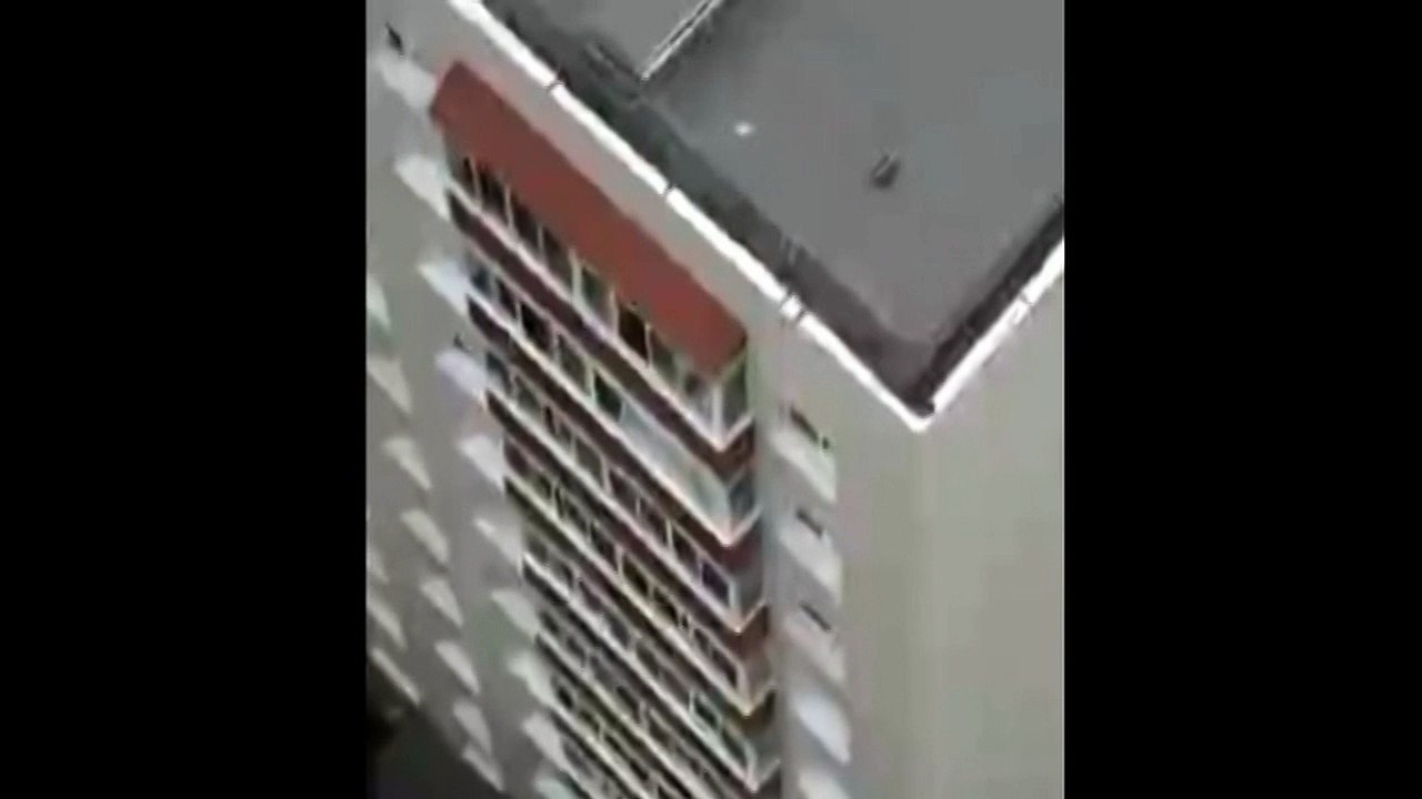 Footage captures toddler playing on eighth floor windowsill