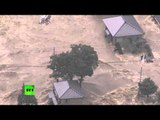 Tsunami-like wall of water after floods hit Japan, tens of thousands evacuated