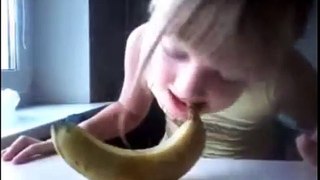 funny peal and eat huge banana