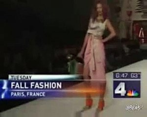 Model falls twice..anchor man laughs