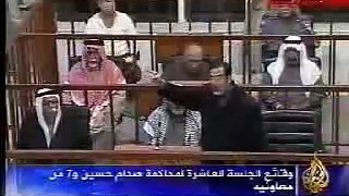 صدام و الملحمه داخل قاعة المحكمه5