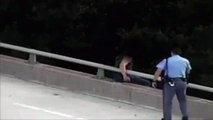 Cop Talks Man From Jumping Off Bridge And Then Gives Him A Hug!