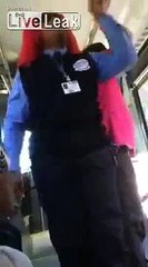 Bus driver with Bozo the Clown hair chews out one of her passengers