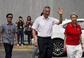 Singapore votes in hotly contested poll, though ruling party bound to win