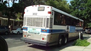 MTA Bus: 2005 MCI D4500CL QM4 #3032 & 1998 Orion V CNG Q64 Bus #9991 at Main St