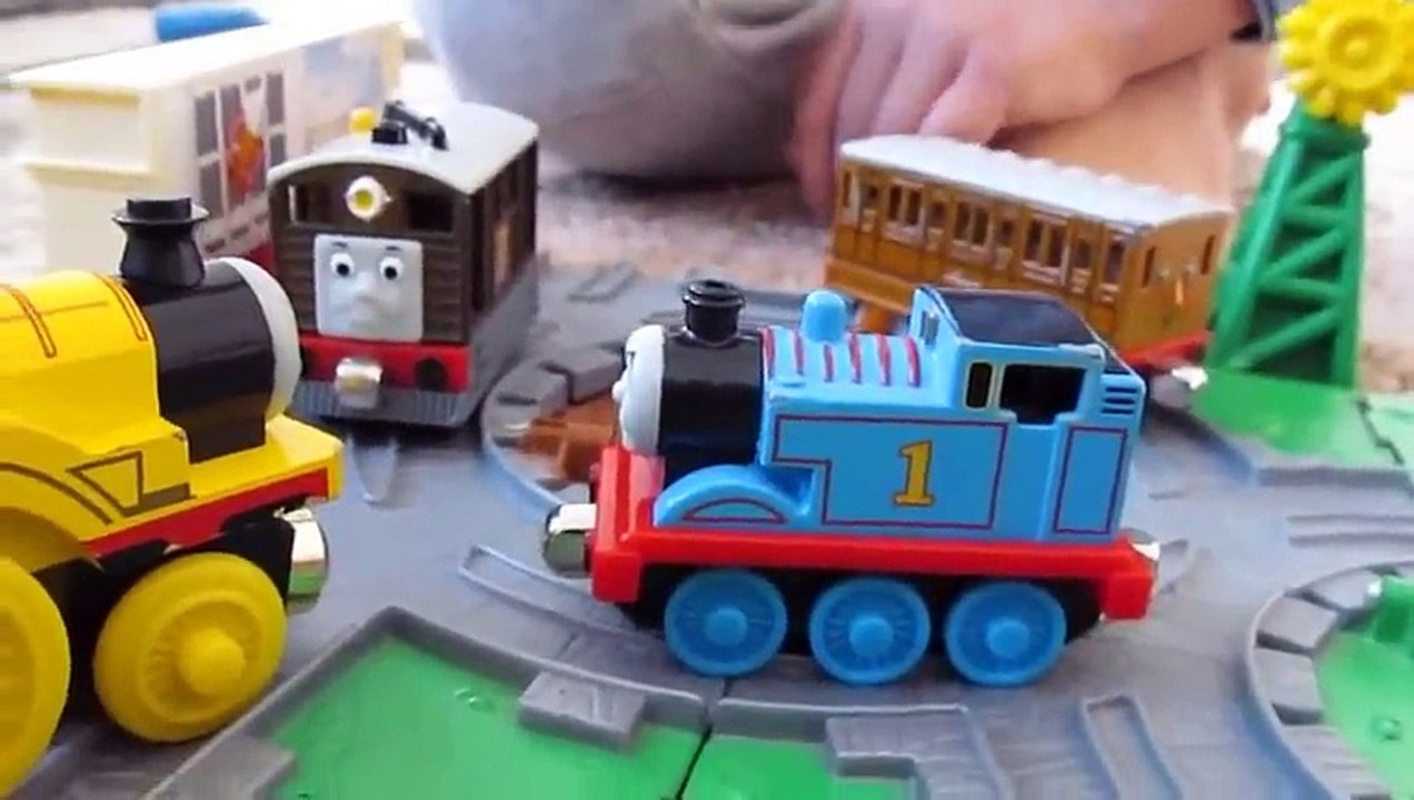 Kid plays with Thomas the tank engine toys skunk whoopi cushin