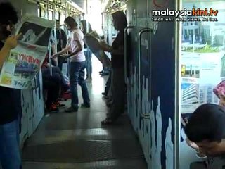 Press Freedom flashmob baffles LRT commuters