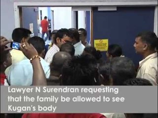 Hospital attendent waves family in