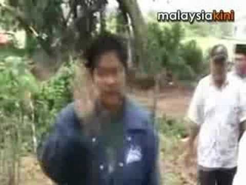 Excavator torched in battle to keep burial ground