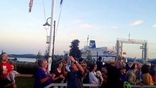 Riders at 2014 BC Bike Race exit ferry, receive a heroes' welcome from the community of Powell River