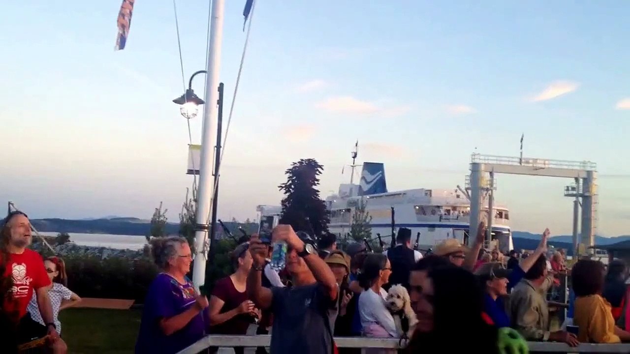 Riders at 2014 BC Bike Race exit ferry, receive a heroes' welcome from the community of Powell River