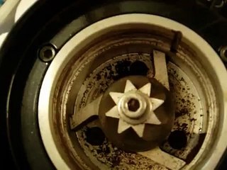 Compak K-10 grinder axis NOT center. Problem  ???