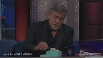 New host Stephen Colbert gives George Clooney wedding gift