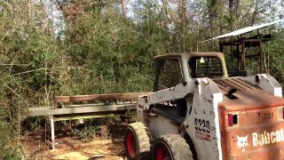 Hydraulic Band Saw Mill cutting antique reclaimed heart pine beams