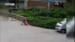 Eleven month old saved after being crushed by minibus in China
