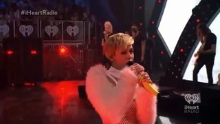 Miley Cyrus cries during Wrecking Ball at iHeartRadio Festival