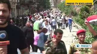 Exclusive: Homs residents return home
