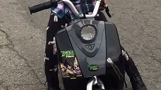 Nasreen El Shabazz learning how to ride her motorcycle