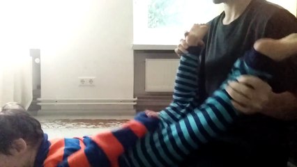 Charlie can put his feet on his head.  My boy!