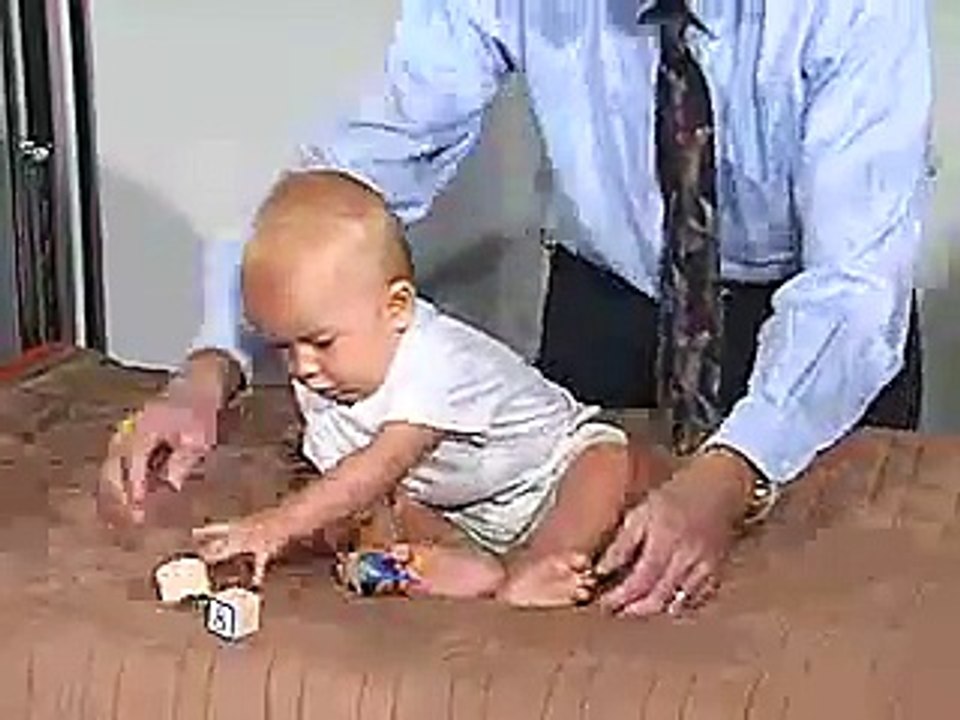 6 Months-Examination of Child