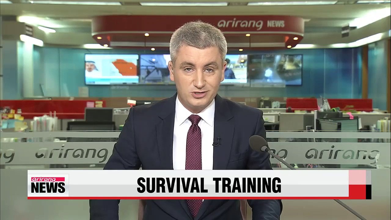 Air Force pilots are put through their paces in survival training drill