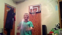 Dunks with a small basketball hoop