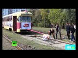 Woman of steel: Russian athlete moves tram car