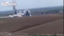 Liveleak   Part of ISIS Suicide Bomber's Vehicle Goes Airborne And Explodes In Mid air