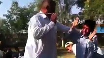School Teacher beating Students with stick