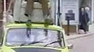 Mr. Bean Video - Mr. Bean driving on roof of a car