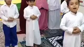 Arab children praying