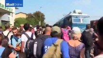 Desperate migrants struggle onto Serbia bound train in Macedonia   Daily Mail Online